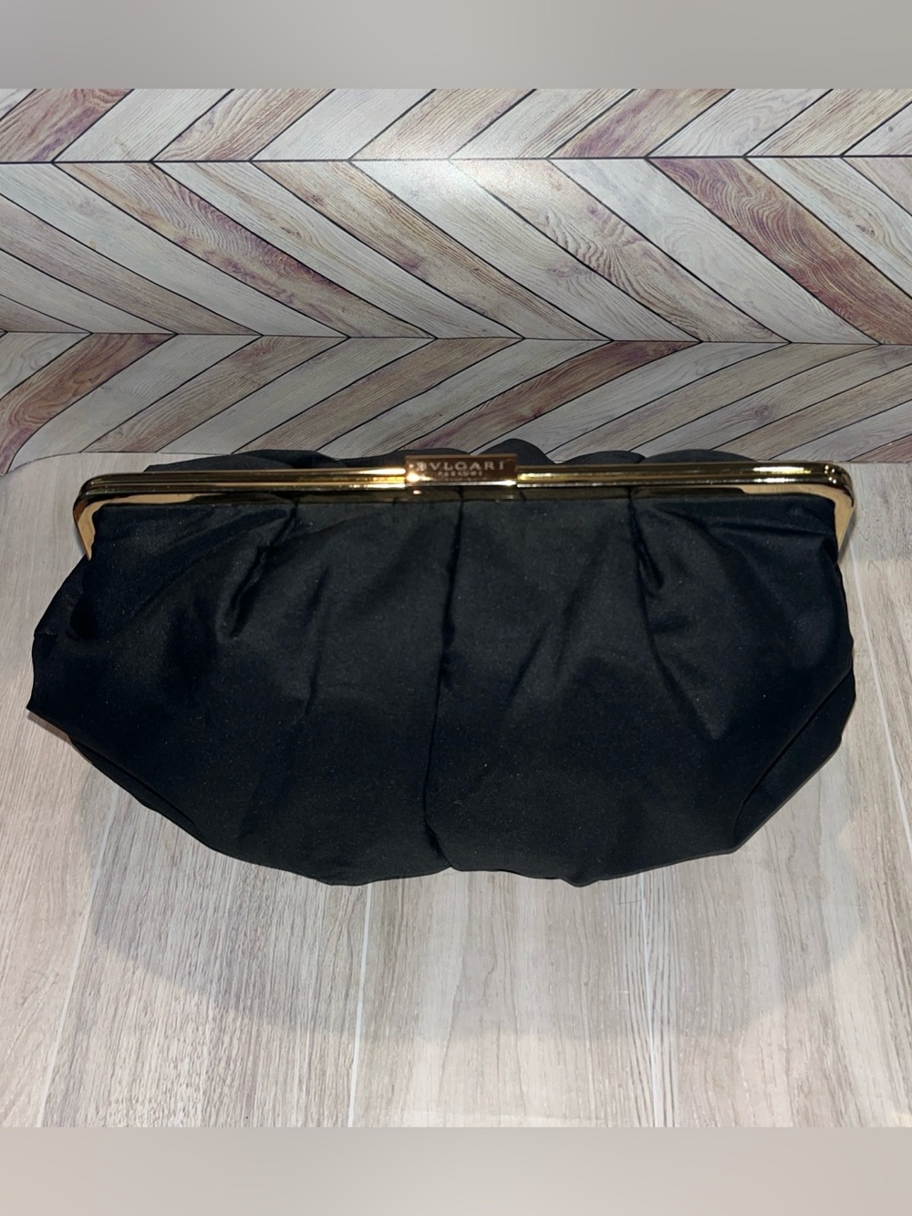 Bvlgari Black clamshell opening pouch /makeup bag / Clutch with Gold frame